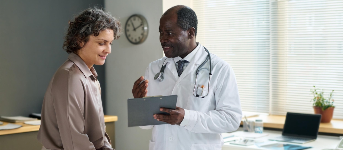 doctor talking to woman